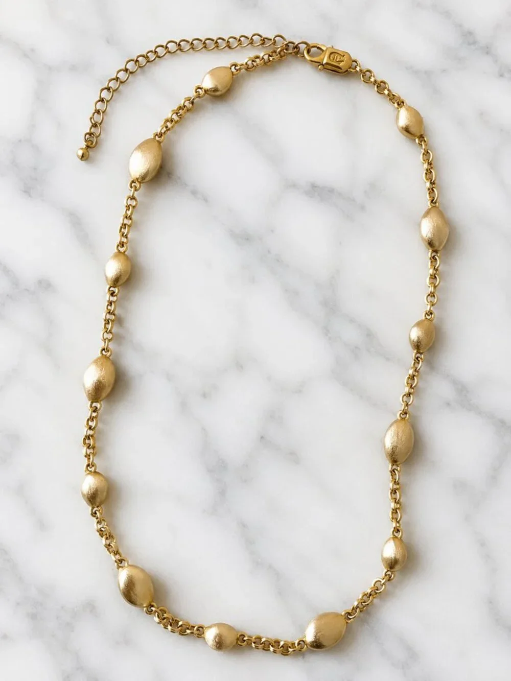 Vintage Etienne Aigner Gold Tone Textured Oval Station Necklace